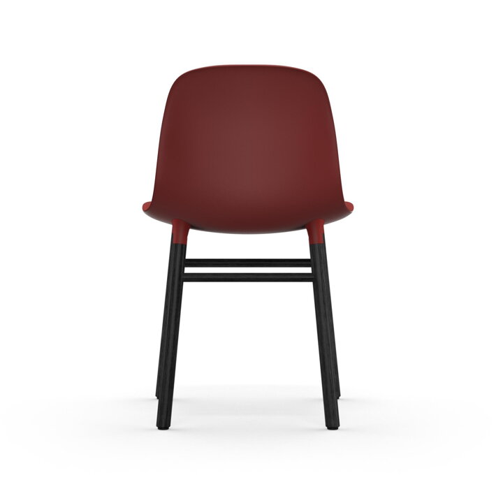Zadná strana červenej jedálenskej stoličky s čiernymi dubovými nohami