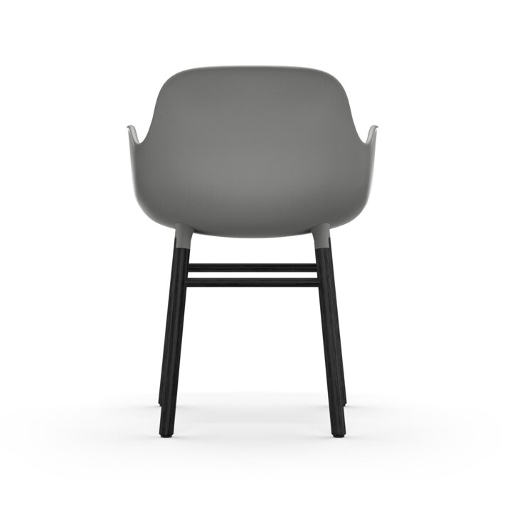 Záber zo zadu na sivú jedálenskú stoličku s podrúčkami a s čiernymi dubovými nohami