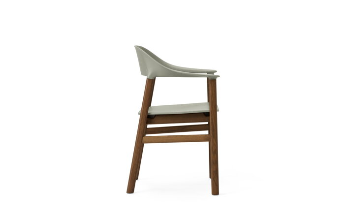Detail bočnej strany zelenej stoličky s podrúčkami