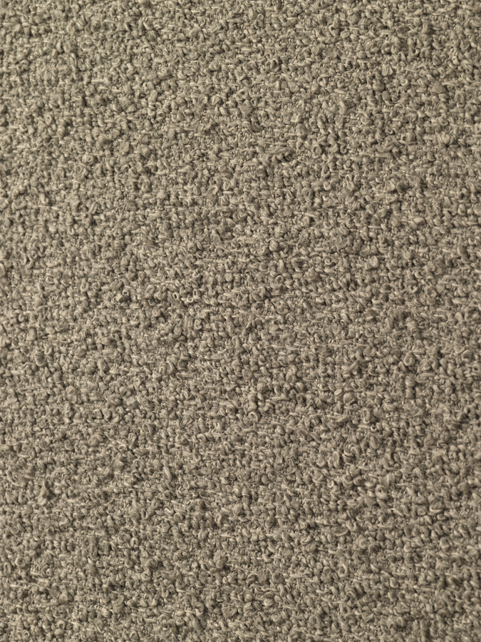 Detail pieskovej látky v čalúnení Pure Bouclé. 