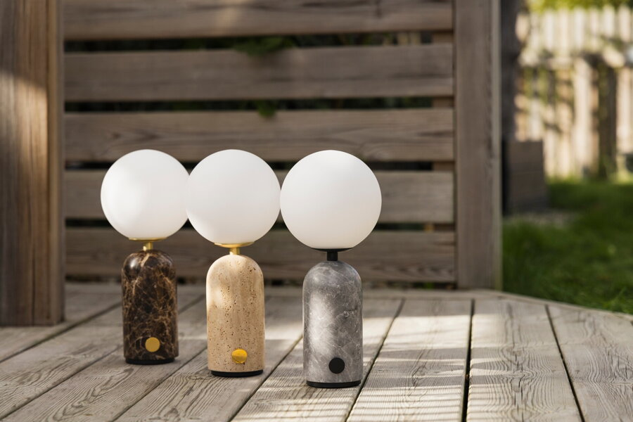 Tri prenosné stolové lampy Torrano v béžovej, hnedej a sivej farbe.