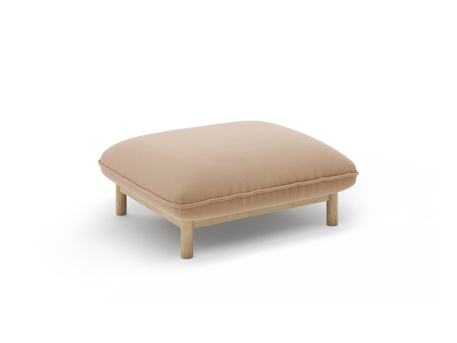 Puf Ada v čalúnení pieskovej farby.