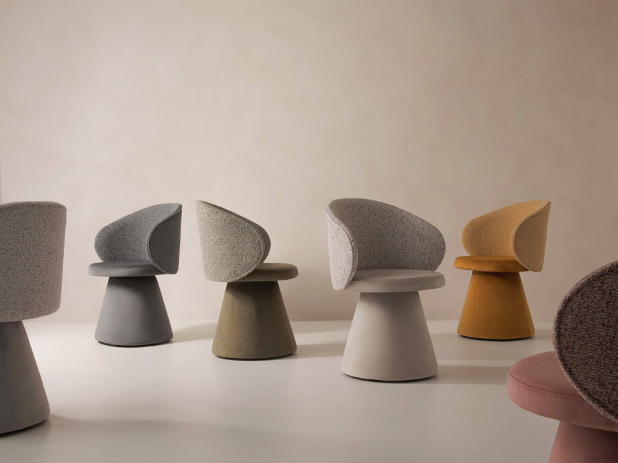 Viaceré stoličky Inez s dvojitým čalúnením v rôznych farebných prevedeniach.