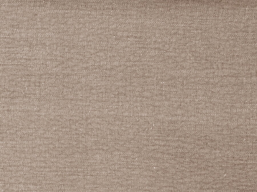 Vzorka tkaniny Structured fabric (Lins) v pieskovej farbe, z ktorej je vyrobený poťah na sedačku.