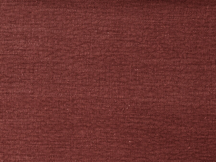 Vzorka tkaniny Structured fabric (Lins) v červenohnedej farbe, z ktorej je vyrobený poťah na sedačku.