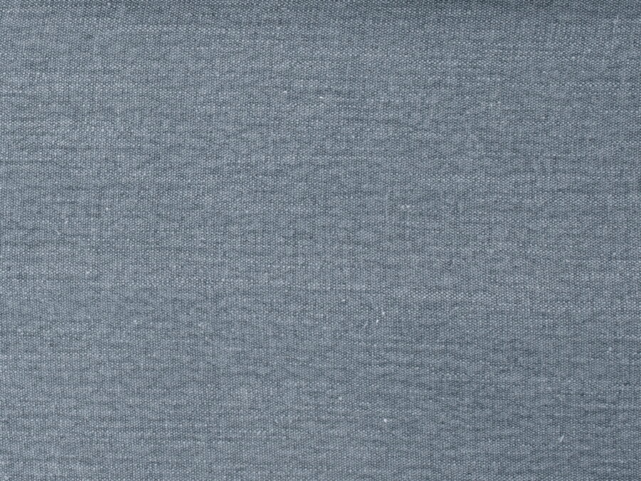 Vzorka tkaniny Structured fabric (Lins) v svetlomodrej farbe, z ktorej je vyrobený poťah na sedačku.