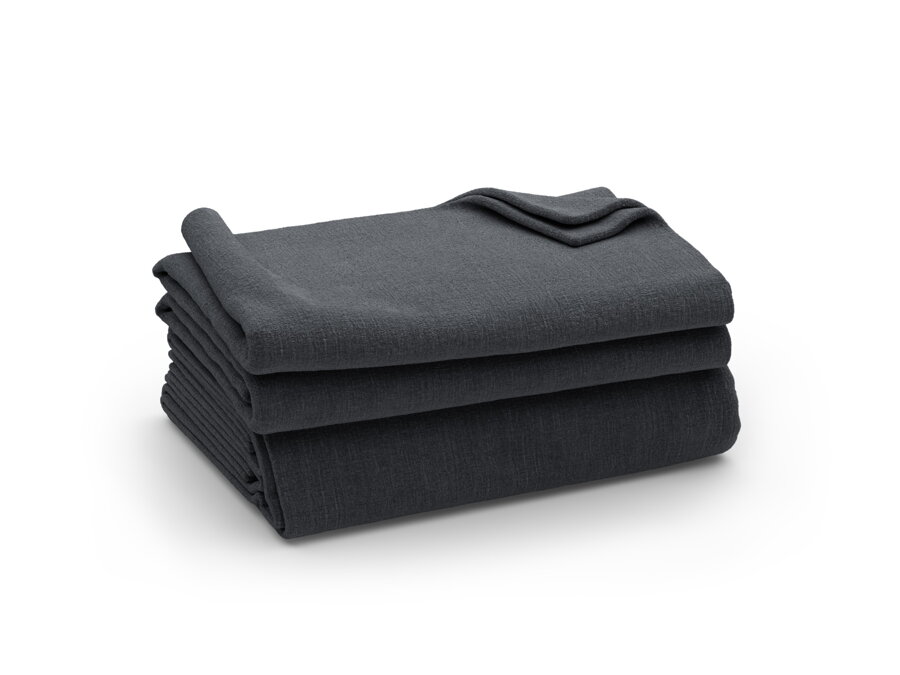 Poskladaný poťah na 4-miestnu pohovku Jodie z tkaniny s ľanovým efektom sivomodrej farby.