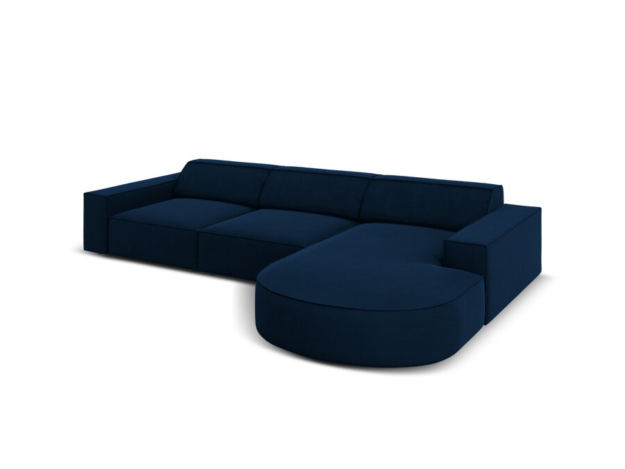Rohová sedačka Jodie v čalúnení Velvet (Bluvel) v tmavomodrej farbe.
