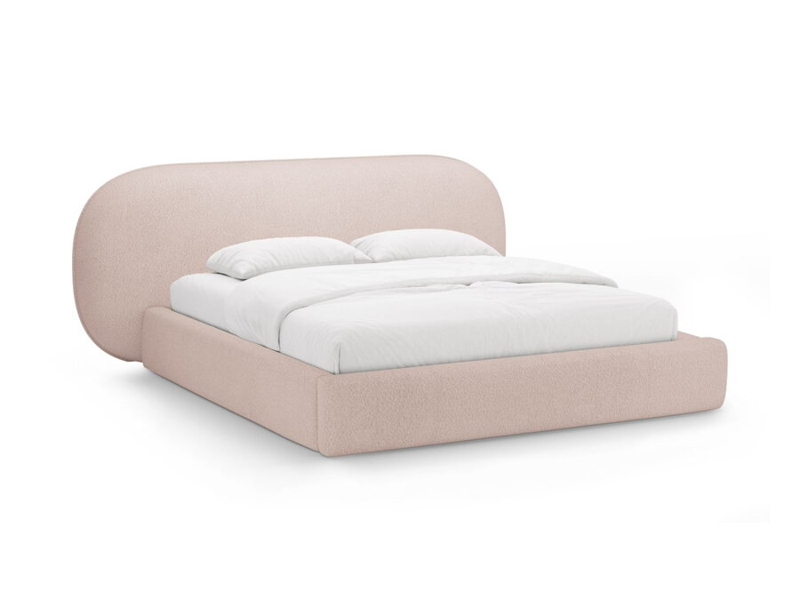 Manželská posteľ Ovalo v čalúnení Boucle pudrovej ružovej farby.