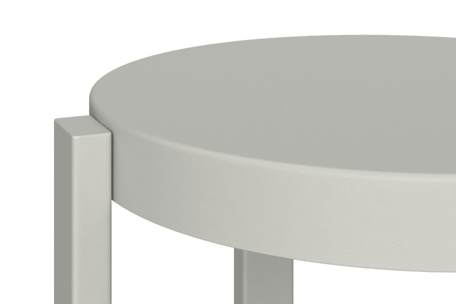 Detail na matnú práškovú povrchovú úpravu oceľového sivého príručného stolíka.