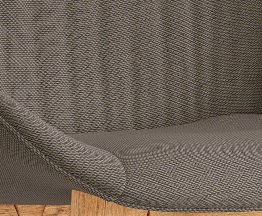 Detail na tmavohnedý čalúnený sedák stoličky Hyg Comfort s dubovými nohami